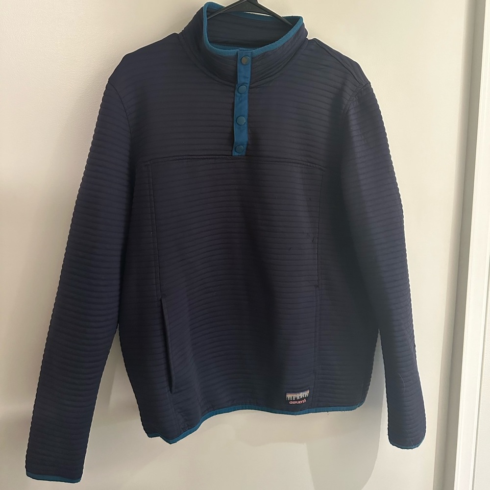 Medium blue Gerry fleece that has been preloved